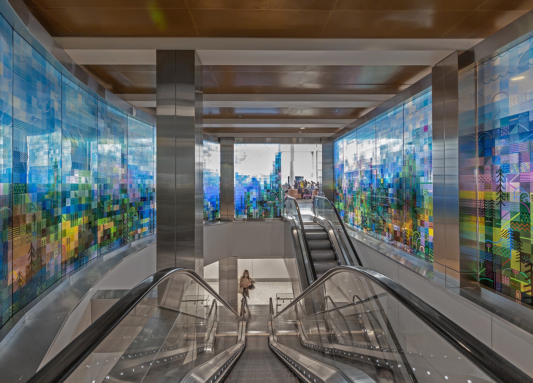 KARE　Picture Glass Escalator Show アート Cascadia by Cable Griffith | Port of Seattle